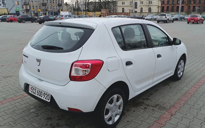 Dacia Sandero cena 23900 przebieg: 140512, rok produkcji 2014 z Ślesin małe 137